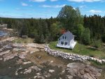 May 2016 Drone Picture the red roof is the garage on the property. Not accessible to renters but not used during any rental